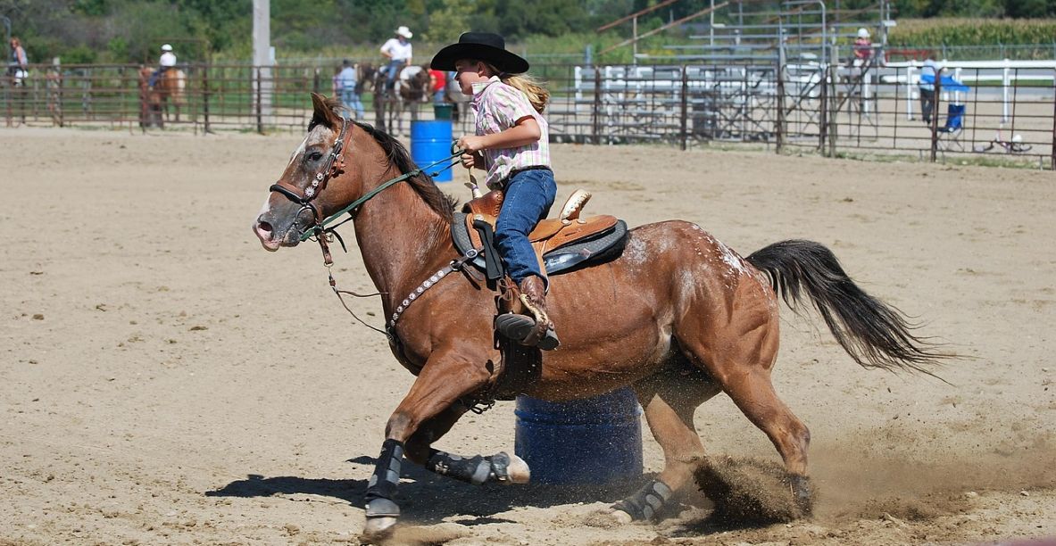 Barrel racing quotes and a girl racing a horse