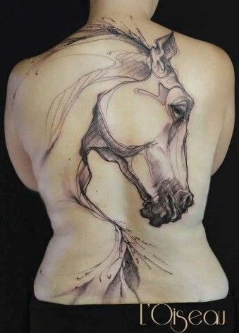 Horse tattoo fully covering a womans back