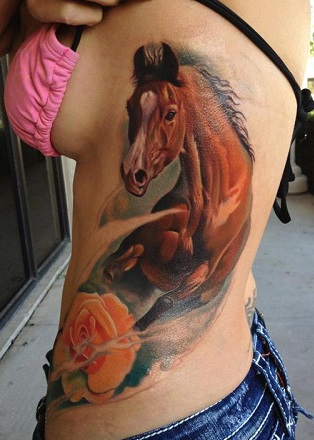 Coloful full side horse tattoo on a woman