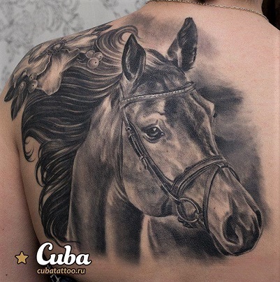 Realistic horse head tattoo to memorialize a horse who the owner has lost