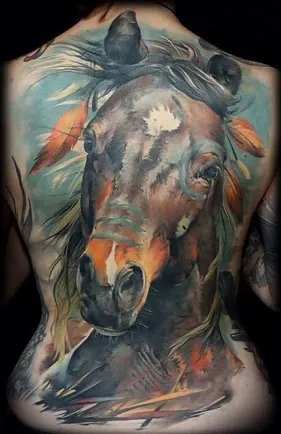 Full back horse tattoo design on a womans back