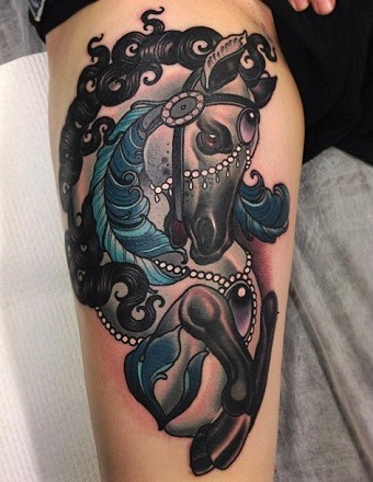 Beautiful horse and gems Indian style tattoo on a womans upper thigh / leg