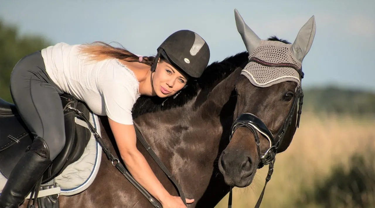 Horse and girl bonding together - Ways to build trust with your horse