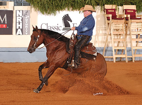 William Shatner horseback riding in a reining competition