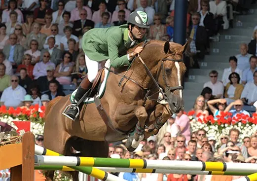 Baloubet Du Rouet horse jumping a fence