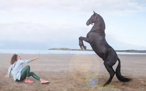 Free Rein TV scene with girl and horse on the beach