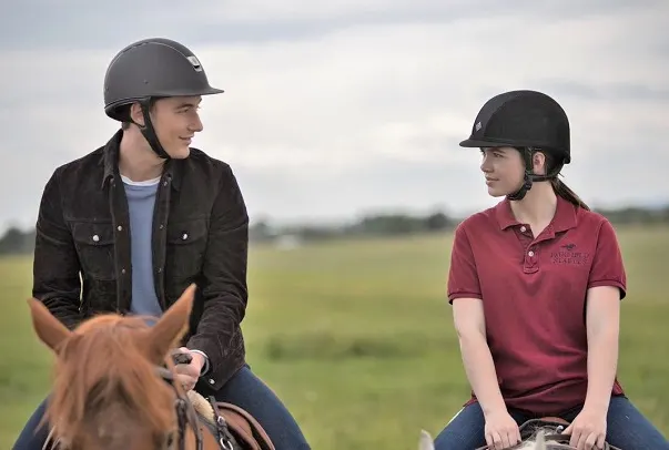 Quinn McGregor and Georgie Fleming-Morris horse riding on Heartland