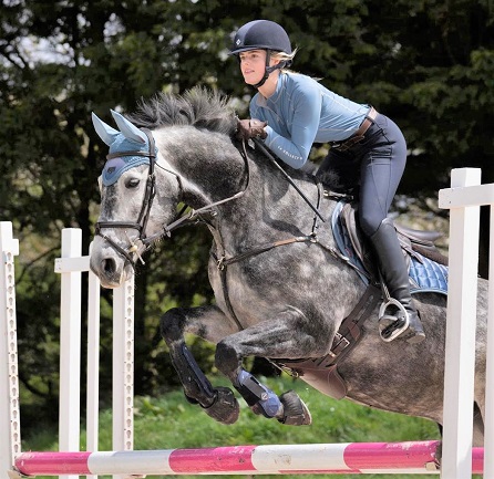 Esme Higgs jumping with her horse Joey