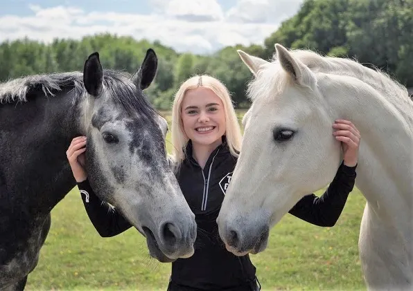 Esme with her horses Joey and Casper