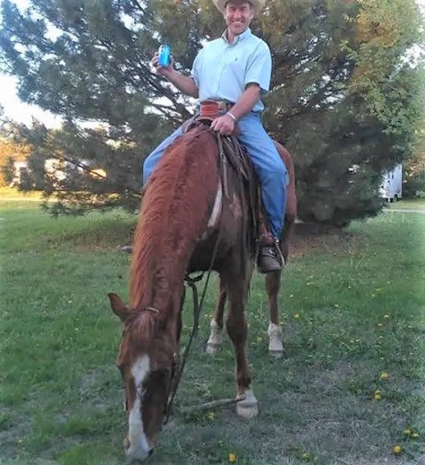 Kevin Adkins riding his horse Vic