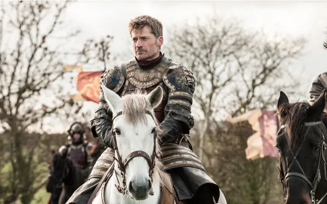 Nikolaj Coster-Waldau riding a horse on Game of Thrones
