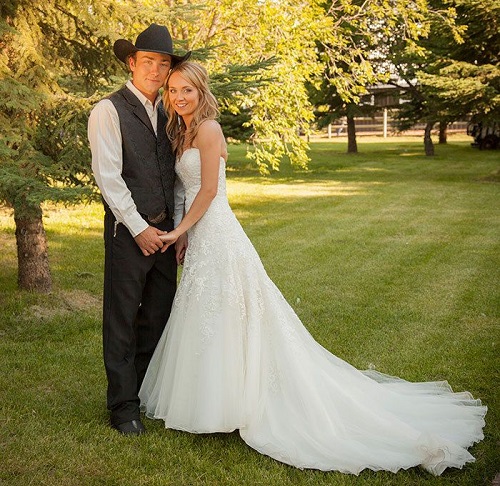 Amber Marshall in her wedding dress with Shawn Turner