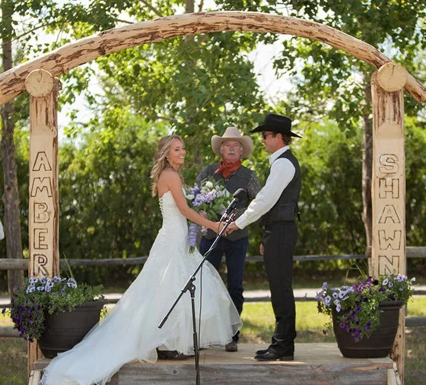 Amber and Shawn at their wedding alter