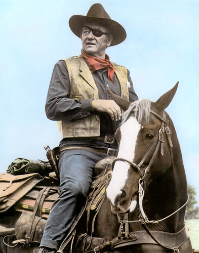 John Wayne riding his horse Dollor