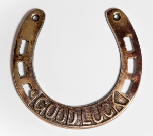 Lucky horseshoe with the words Good Luck engraved on it