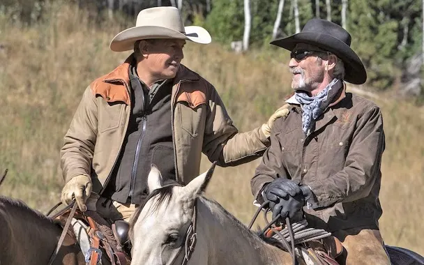 Lloyd and John Dutton riding horses on Yellowstone