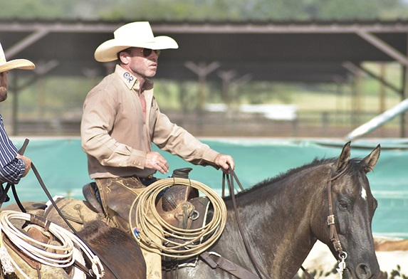 Yellowstone actor Taylor Sheridan riding as a cowboy