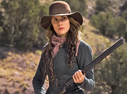 Character Alice Fletcher holding a shotgun in the TV show Godless