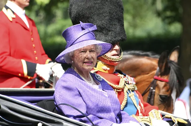 Queen Elizabeth II and Prince Philip seat on the Royal Coach at Queen's Birthday Parade on June 17, 2006 in London, England.