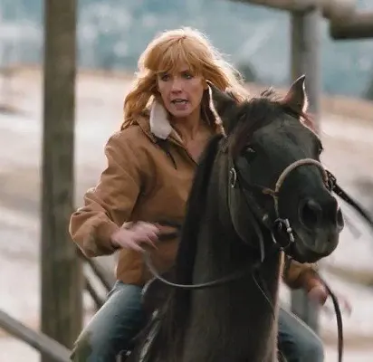 Actress Kelly Reilly as Beth Dutton on Yellowstone riding a horse