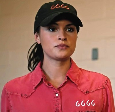 Emily wearing a red 6666 Ranch top on Yellowstone