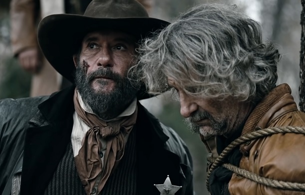 James Dutton talking to a captured horse thief in a Yellowstone season 4 premiere