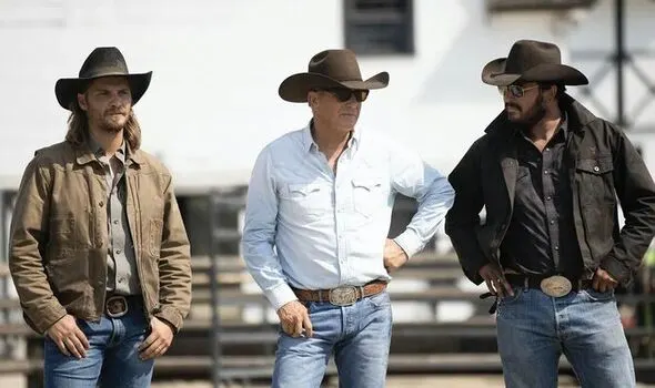 Kayce Dutton, John Dutton, and Rip Wheeler outside the Yellowstone Dutton Ranch barn