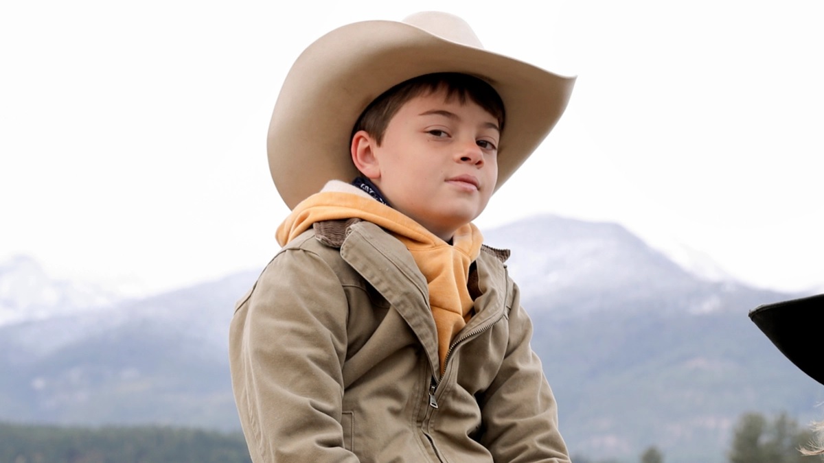 Tate Dutton in the Yellowstone TV series played by actor Brecken Merrill