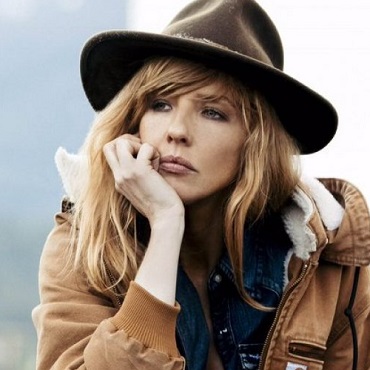 Yellowstone TV series character Beth Dutton looking off into the distance