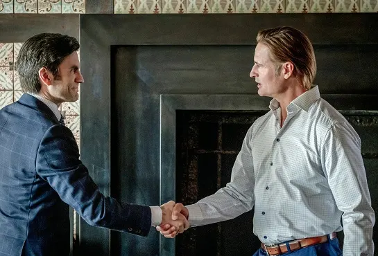 Jamie Dutton and Roarke shaking hands in Yellowstone