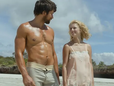 Spencer Dutton and Alexandra holding hands on an African beach in the 1923 TV series