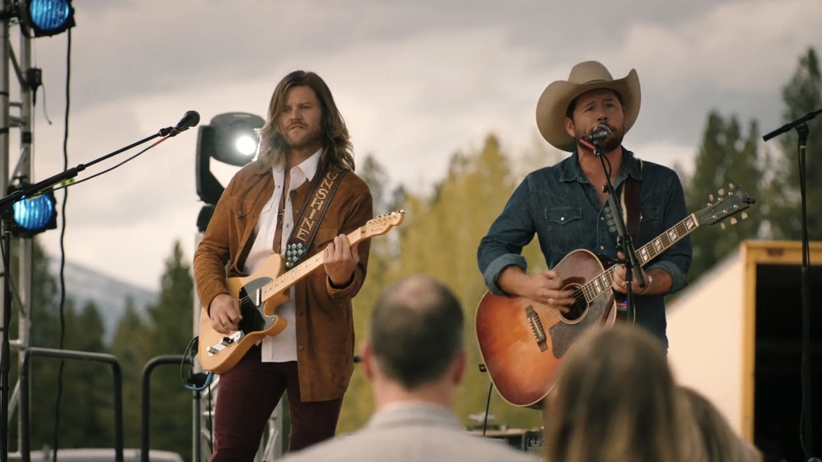 Shane Smith and the Saints western band performing a song on stage during a Yellowstone season 5 episode