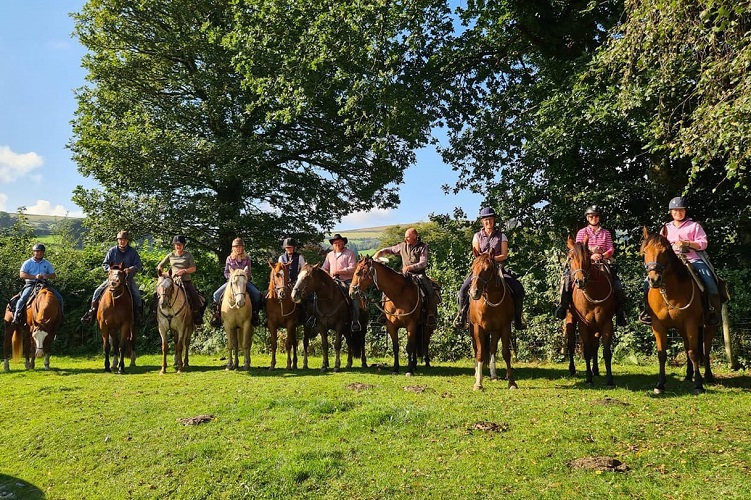 Several tourists riding horse at Dartmoor Riding Holidays & Cattle Drives