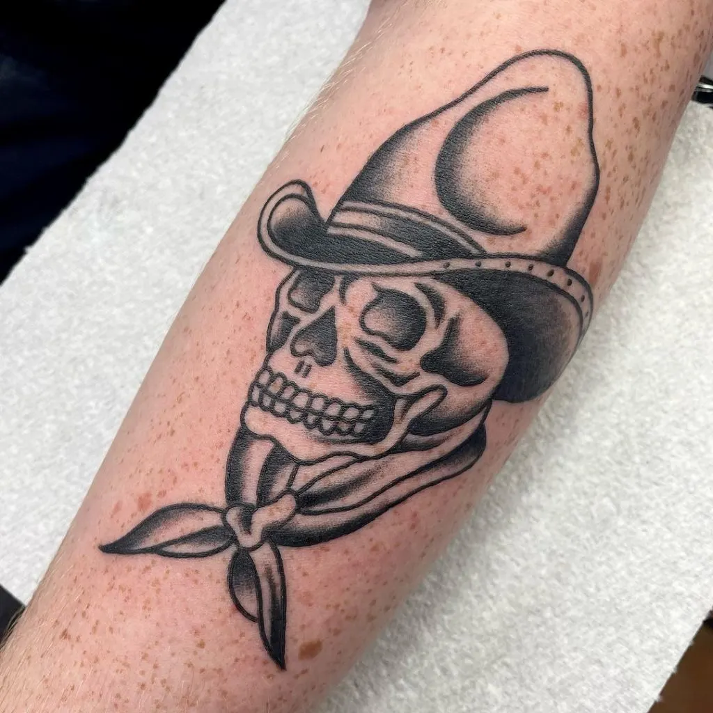 Skull in arrow shot cowboy hat tattoo Royalty Free Vector