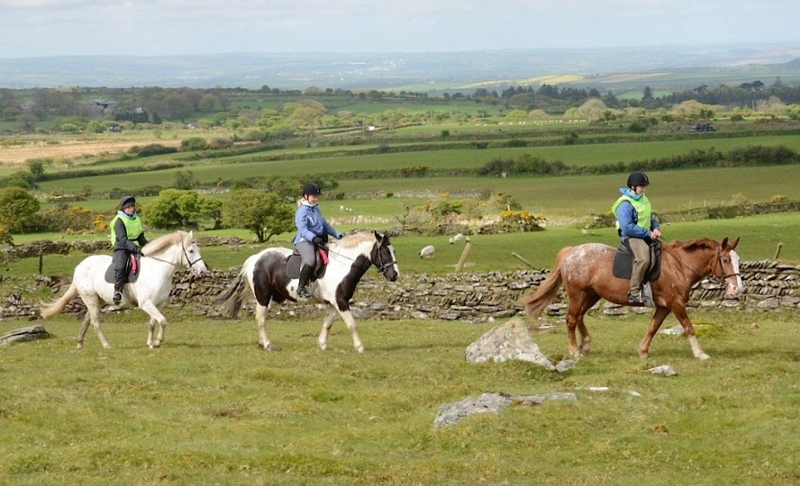 Guest riding horses on a Discover Cornwall Ride holiday
