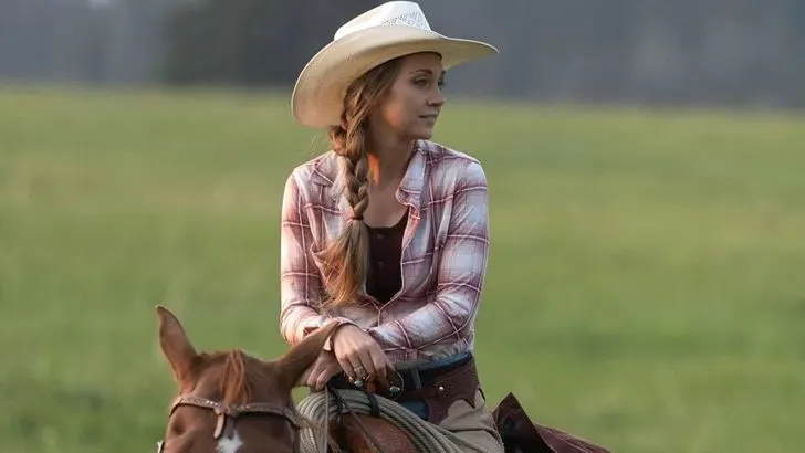 Amy Fleming riding a horse in Heartland season 16
