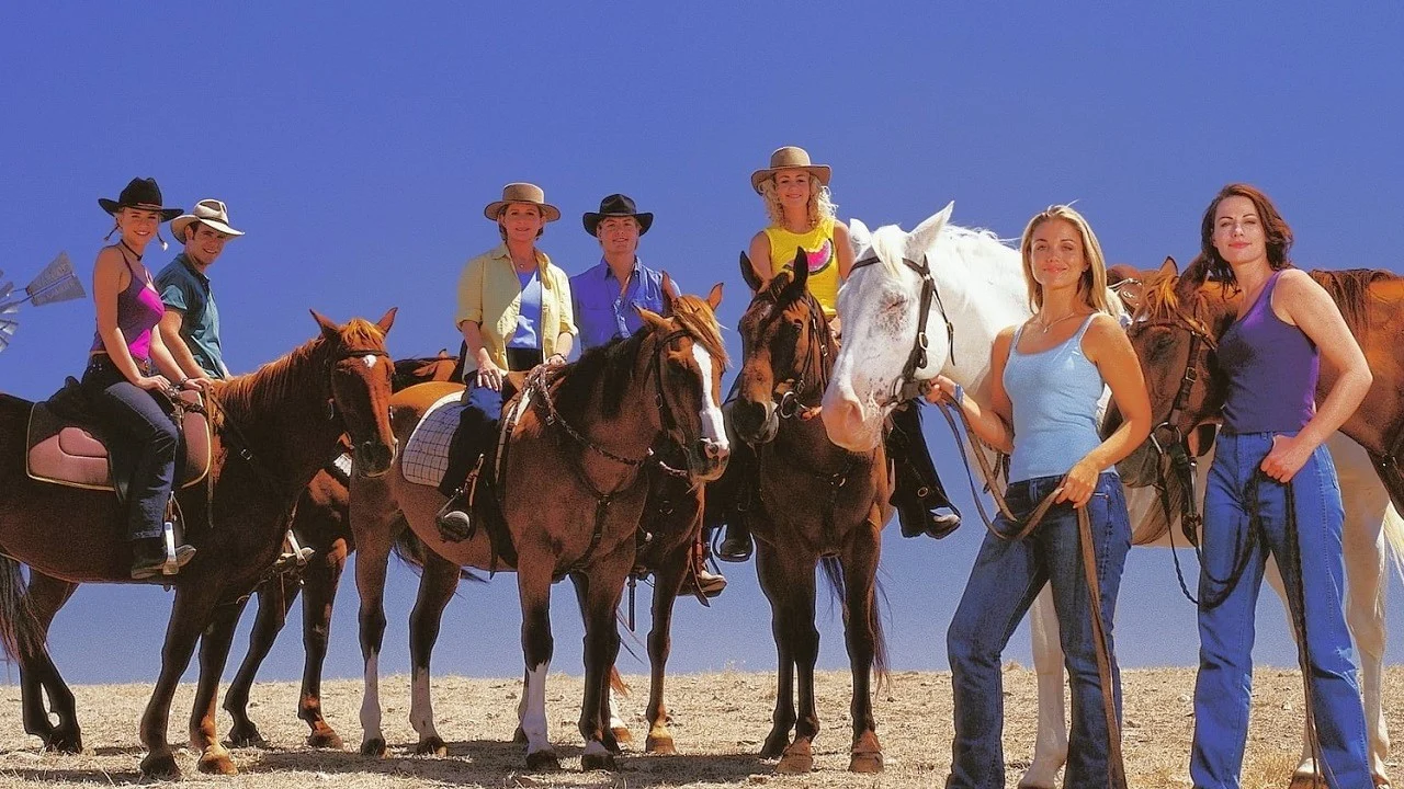 Main actors riding horses in the McLeod's Daughters TV show