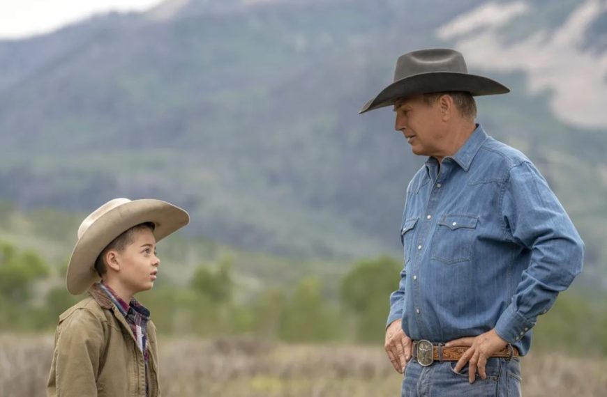 John Dutton (Kevin Costner) and his grandson Tate (Brecken Merrill) in Big Sky Country in Yellowstone TV series created by Taylor Sheridan