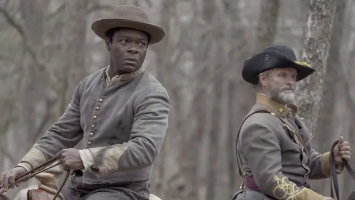 Young Bass Reeves and another US Marshall riding horses in Lawmen Bass Reeves